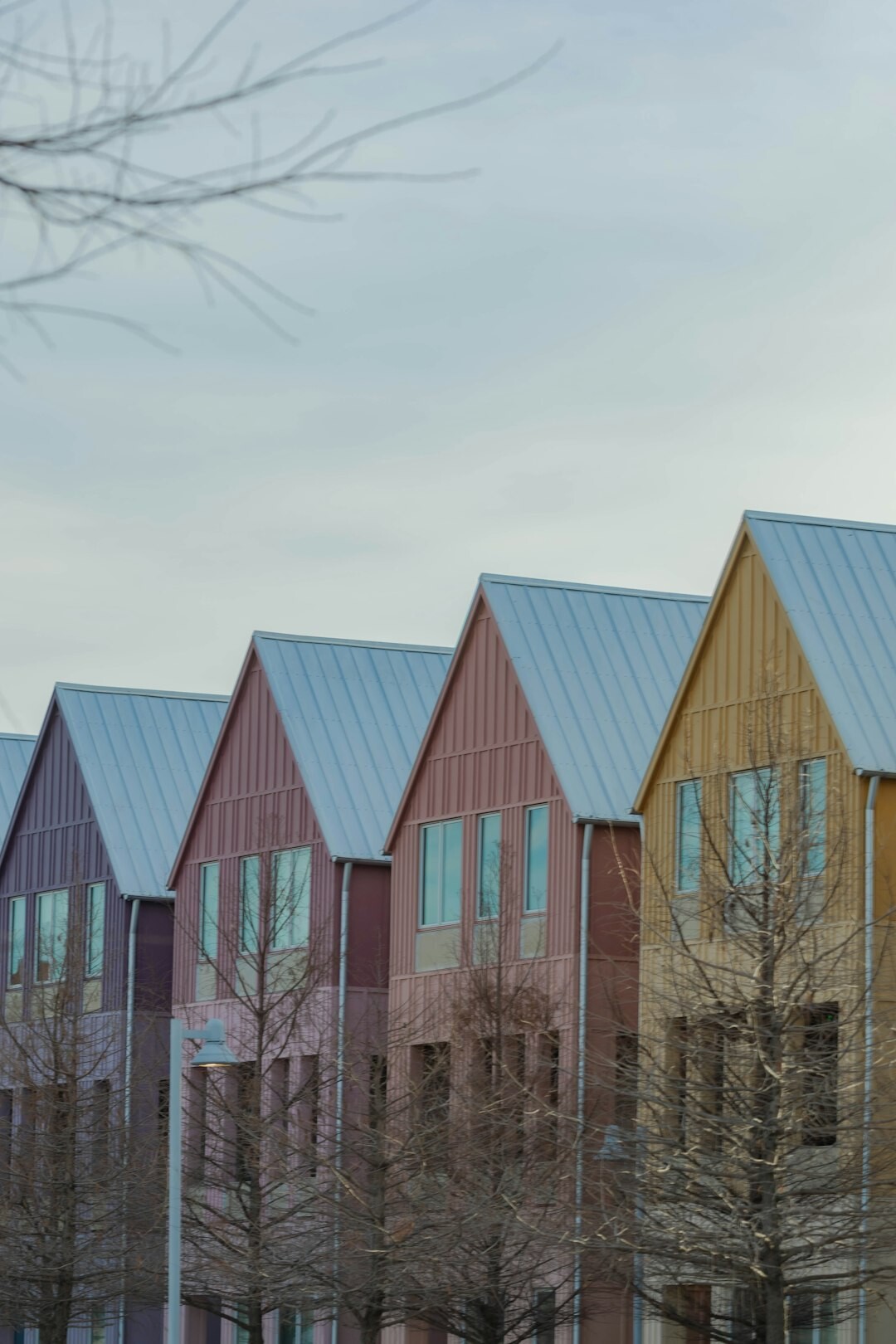 Close view of colorful corrugated metal houses in a Chilean hillside neighborhood
