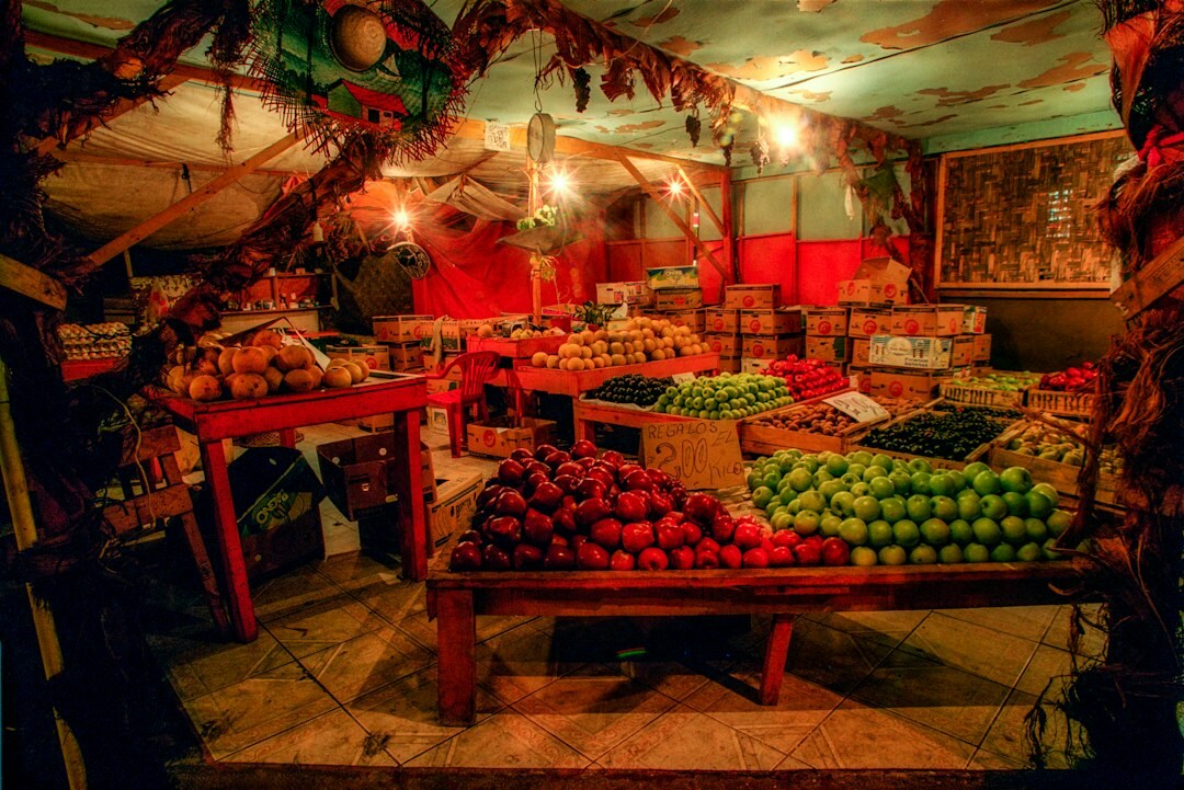 Busy street market scene in a Chilean neighborhood with vendors and shoppers